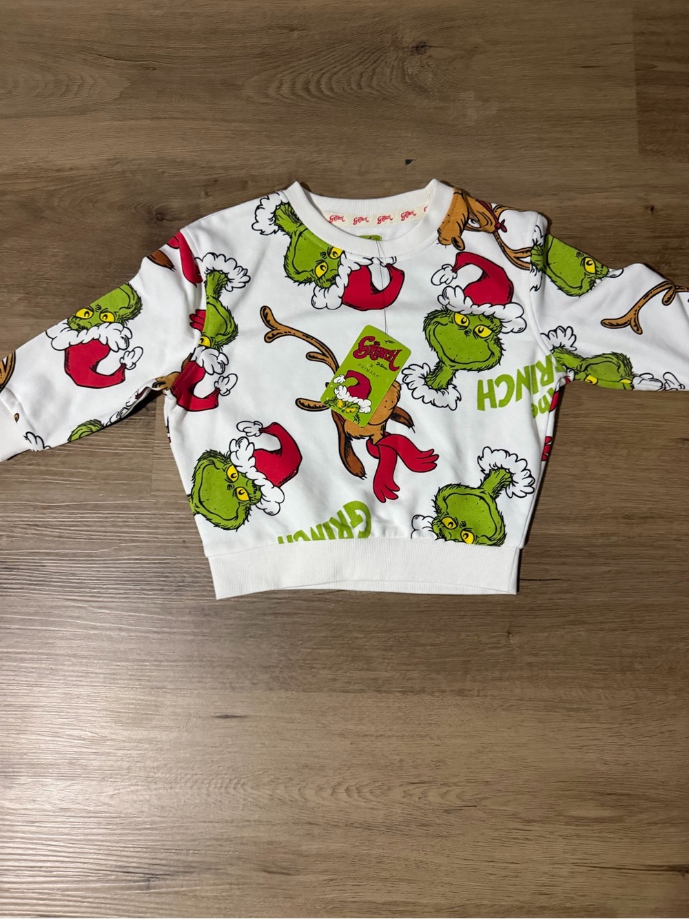 Primark White Grinch Graphic Sweatshirt with Red & Green Accents